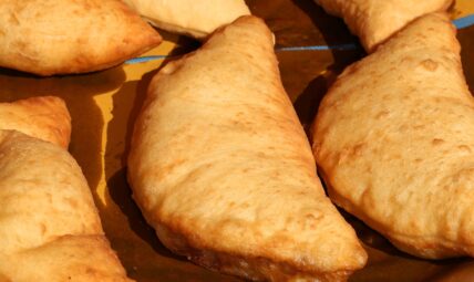 Fried dough pastries on a plate