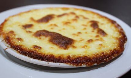 Melted cheese dish on plate