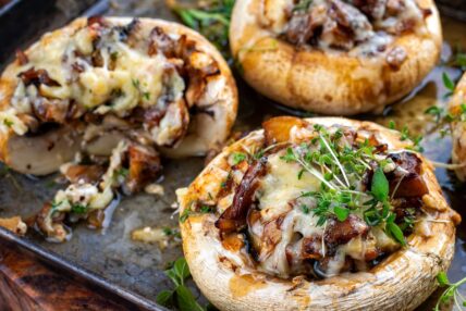 Baked mushrooms with cheese and herbs