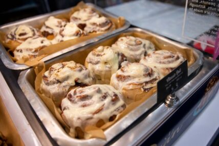 Freshly baked cinnamon rolls are ready for purchase at Cinnabon.