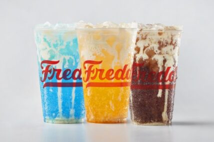 Freddy's new lineup of premium beverages. Pictured from L to R: Blue Rizzberry Cream Soda, Golden Hour Orange Custard Cream Soda, Coco Loco Custard Cream Soda.