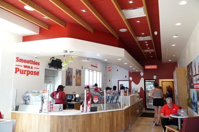 The interior of Livonia's Smoothie King features a red and white motif. Livoniasmoothieking3