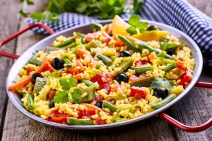 Colorful Vegetarian Paella Rice Dish Served in Pan